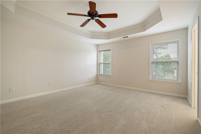 3382 Galleon Dr, Alpharetta, GA 30004 - empty room with crown molding, a tray ceiling, a ceiling fan, and baseboards