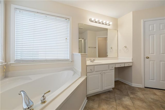 3382 Galleon Dr, Alpharetta, GA 30004 - full bath with vanity, a garden tub, a shower with shower door, tile patterned floors, and baseboards