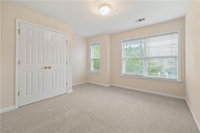 3382 Galleon Dr, Alpharetta, GA 30004 - unfurnished bedroom with carpet, baseboards, and a closet