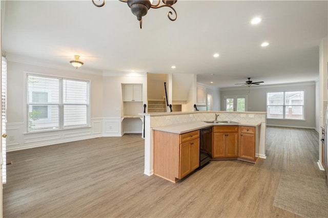 3382 Galleon Dr, Alpharetta, GA 30004 - kitchen featuring a sink, dishwasher, open floor plan, a ceiling fan, and light wood-type flooring
