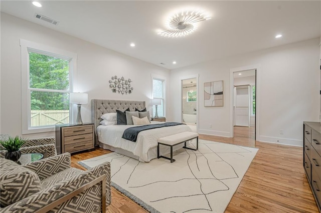 1273 Grayson Pkwy, Grayson, GA 30017 - bedroom with light wood-style floors, recessed lighting, baseboards, and ensuite bathroom