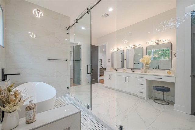 1273 Grayson Pkwy, Grayson, GA 30017 - bathroom with marble tiled flooring, a shower stall, a freestanding bath, vanity, and tile walls