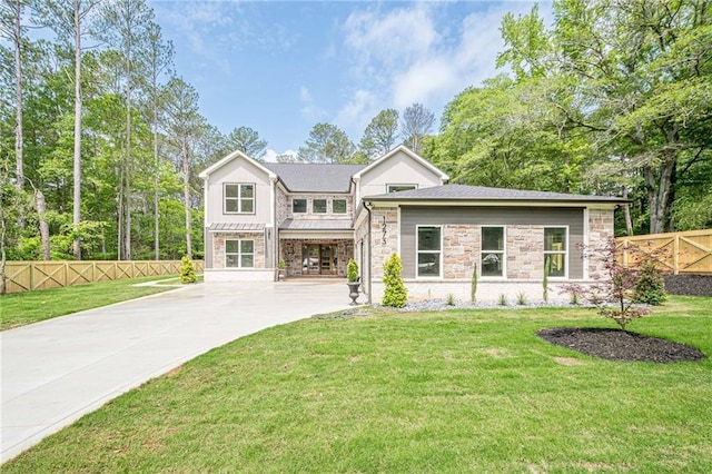 1273 Grayson Pkwy, Grayson, GA 30017 - view of front facade with stone siding and concrete driveway