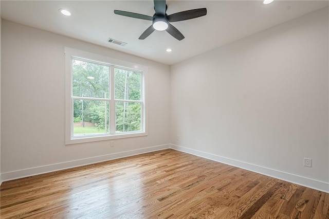 1273 Grayson Pkwy, Grayson, GA 30017 - unfurnished room with baseboards, wood finished floors, recessed lighting, and a ceiling fan