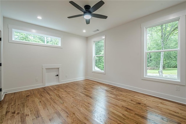1273 Grayson Pkwy, Grayson, GA 30017 - unfurnished room featuring baseboards, a ceiling fan, wood finished floors, and recessed lighting