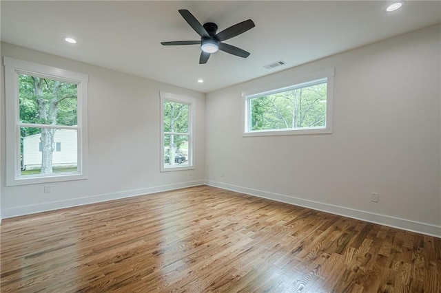 1273 Grayson Pkwy, Grayson, GA 30017 - empty room featuring wood finished floors, baseboards, ceiling fan, and recessed lighting