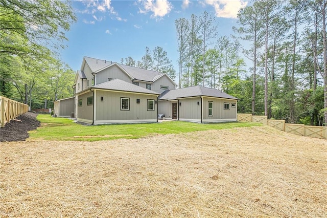 1273 Grayson Pkwy, Grayson, GA 30017 - rear view of property featuring a patio and view of wooded area