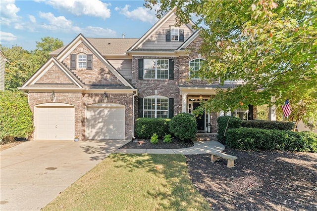 craftsman-style home with a garage