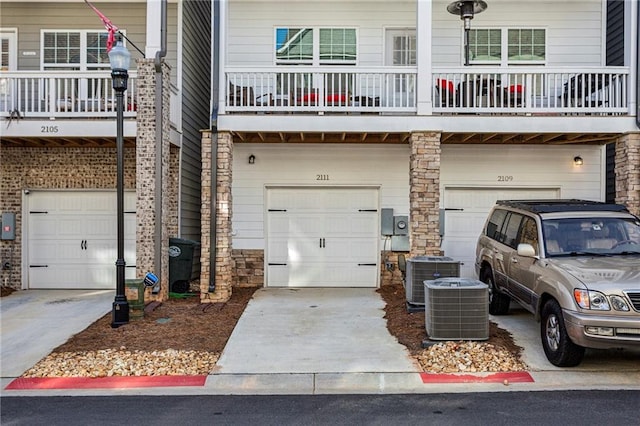 2111 Wesson Ct, Kennesaw, GA 30144 - garage with central AC and driveway