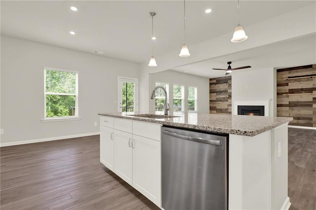 56 Preserve Pt, Jasper, GA 30143 - kitchen with dishwasher, open floor plan, a ceiling fan, light stone countertops, and a center island with sink