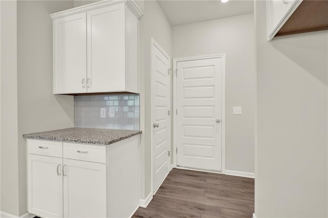 56 Preserve Pt, Jasper, GA 30143 - kitchen with dark wood-type flooring, light stone countertops, backsplash, white cabinets, and recessed lighting