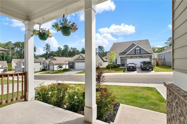 56 Preserve Pt, Jasper, GA 30143 - covered porch with a residential view and a yard