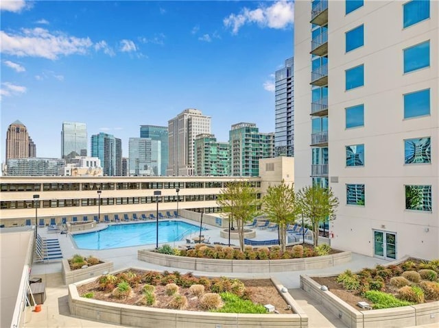 community pool featuring a city view