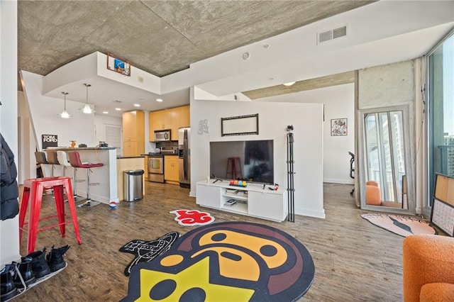 living room featuring baseboards, visible vents, and dark wood-style flooring