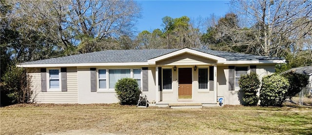 single story home with a front yard