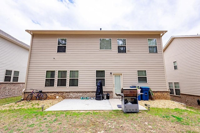 rear view of house with a patio area