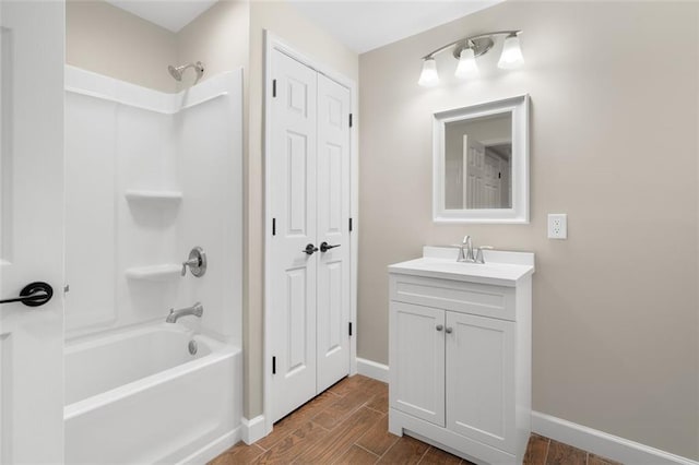 bathroom with vanity and tub / shower combination