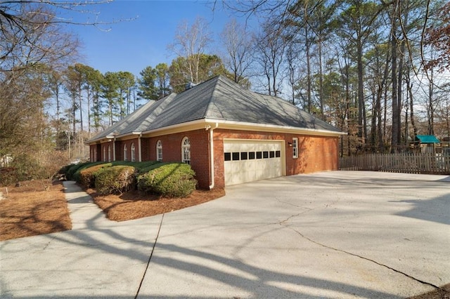 view of home's exterior with a garage