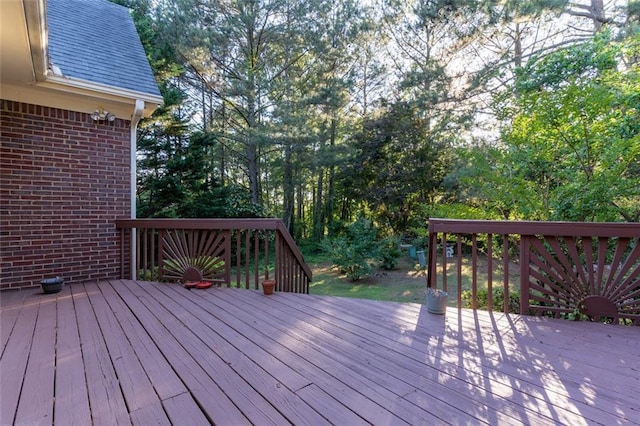 deck with view of wooded area