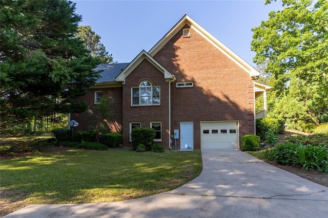 view of side of property with a garage, driveway, a lawn, and brick siding