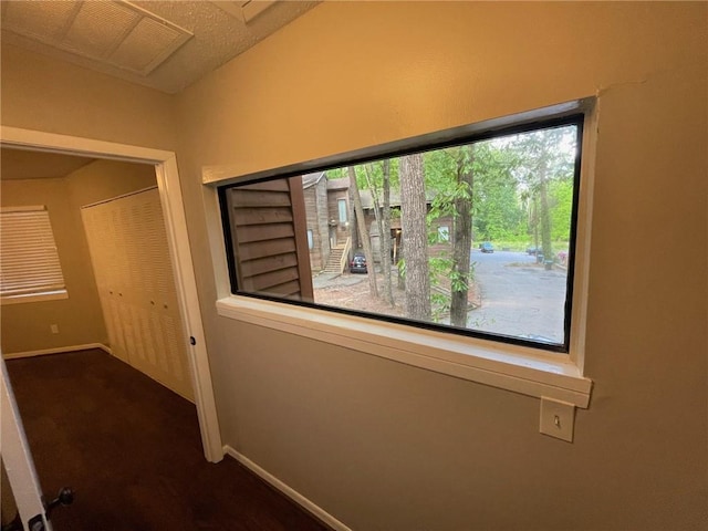 2449 Terrace Trl, Decatur, GA 30035 - corridor with dark colored carpet and baseboards