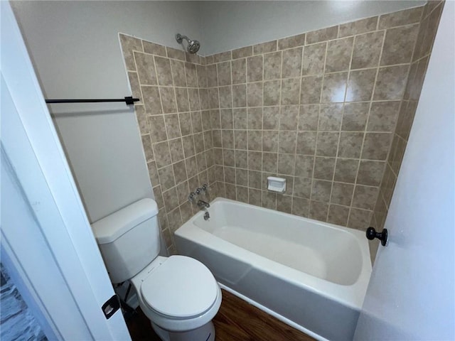 2449 Terrace Trl, Decatur, GA 30035 - full bathroom with toilet, shower / washtub combination, and wood finished floors