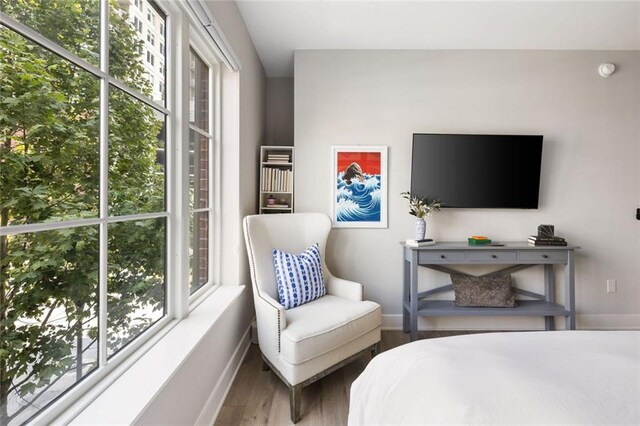 22 Airline St NE Unit 201, Atlanta, GA 30312 - bedroom featuring baseboards and wood finished floors