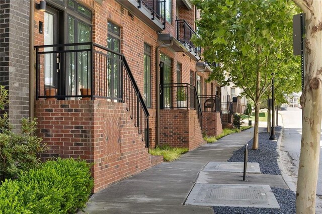 22 Airline St NE Unit 201, Atlanta, GA 30312 - view of side of property with brick siding