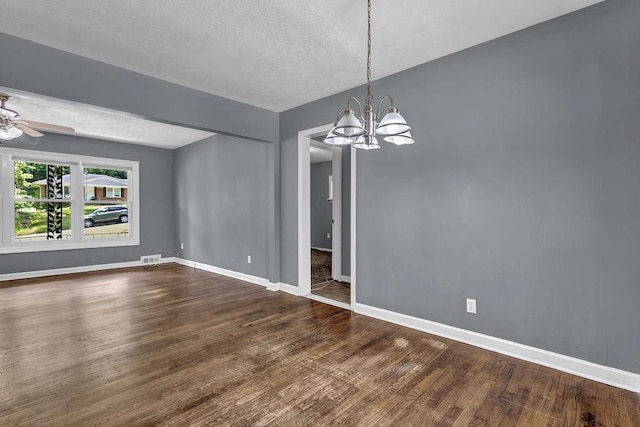 1911 Rosewood Rd, Decatur, GA 30032 - unfurnished dining area featuring dark wood-style floors, a chandelier, baseboards, ceiling fan, and a textured ceiling