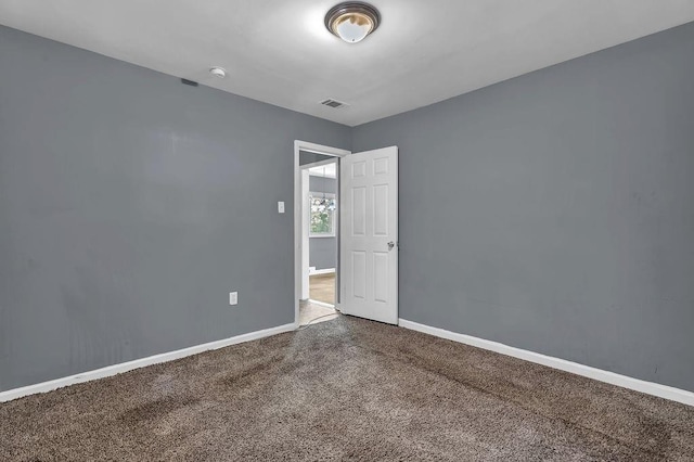 1911 Rosewood Rd, Decatur, GA 30032 - carpeted spare room featuring baseboards