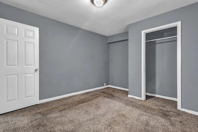 1911 Rosewood Rd, Decatur, GA 30032 - unfurnished bedroom with carpet flooring, baseboards, and a closet