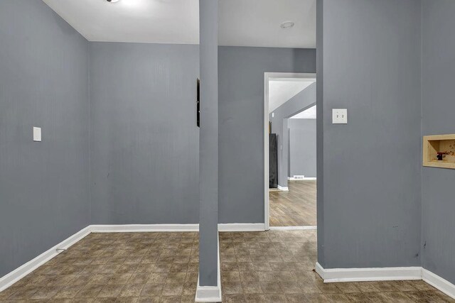 1911 Rosewood Rd, Decatur, GA 30032 - spare room featuring baseboards