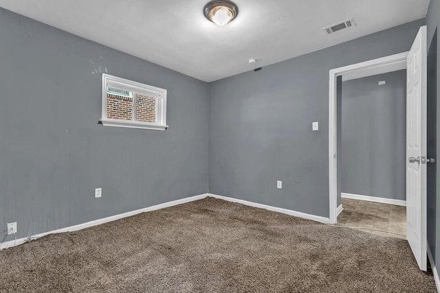 1911 Rosewood Rd, Decatur, GA 30032 - unfurnished bedroom featuring carpet flooring and baseboards