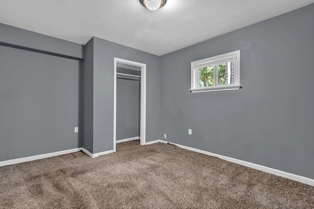 1911 Rosewood Rd, Decatur, GA 30032 - unfurnished bedroom with carpet, baseboards, and a closet