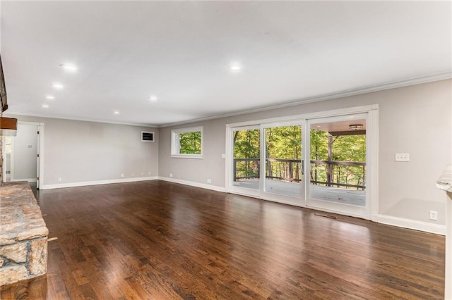 unfurnished living room with ornamental molding and dark hardwood / wood-style flooring