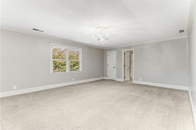 unfurnished room with light colored carpet, ornamental molding, and a chandelier