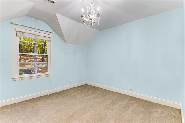 additional living space with light colored carpet, lofted ceiling, and a notable chandelier