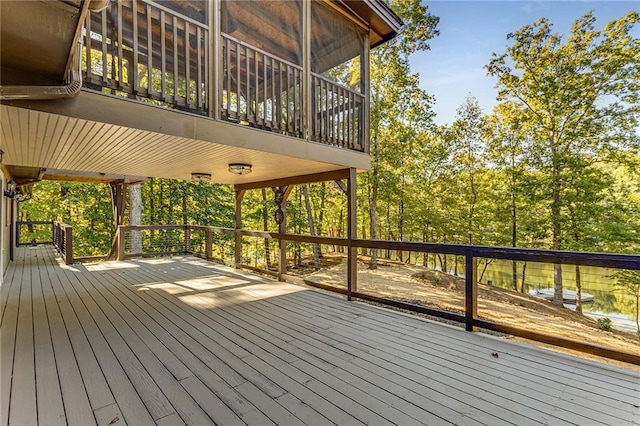 wooden terrace with a water view