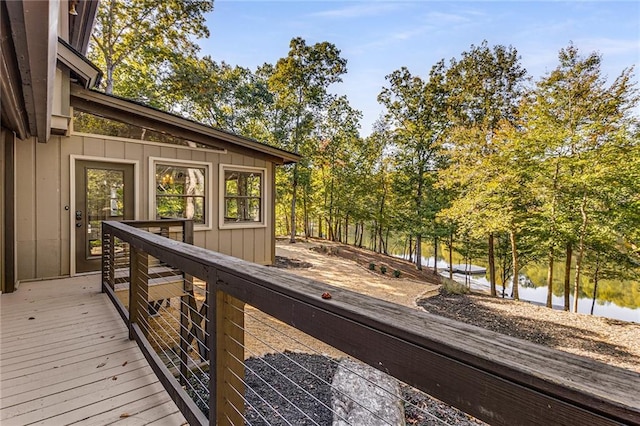 wooden deck with a water view