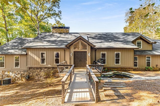 view of front of home featuring central AC unit