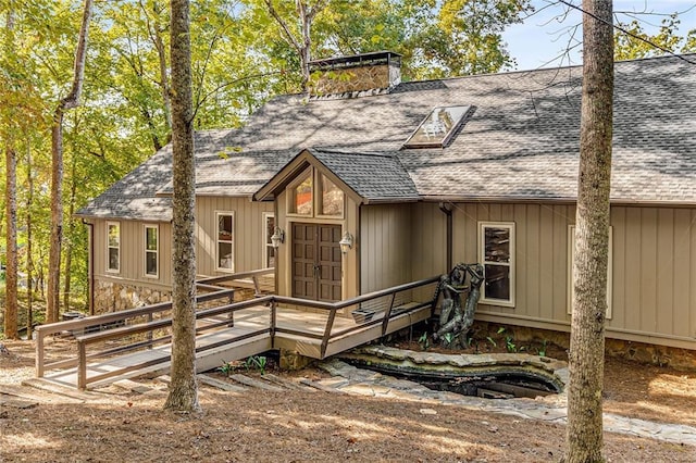 exterior space featuring a wooden deck