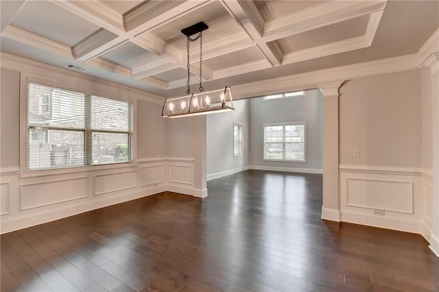 unfurnished dining area featuring beamed ceiling, dark wood finished floors, visible vents, and a decorative wall