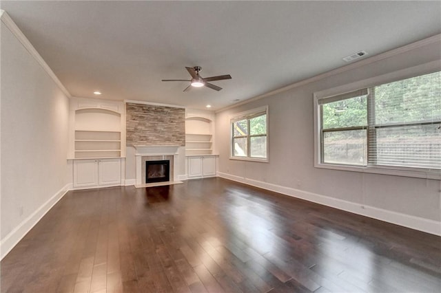 unfurnished living room with ceiling fan, visible vents, ornamental molding, and baseboards