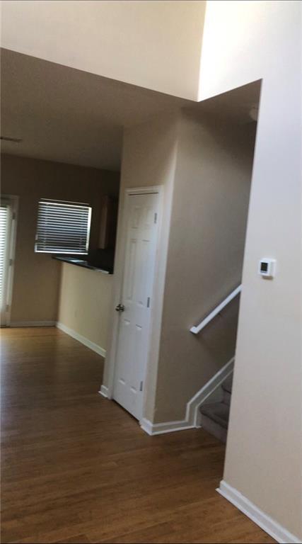 hall featuring dark hardwood / wood-style flooring