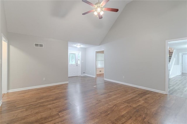 260 Pleasant Grove Cir, Mcdonough, GA 30252 - unfurnished room with high vaulted ceiling, ceiling fan, wood finished floors, and baseboards
