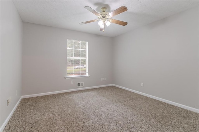 260 Pleasant Grove Cir, Mcdonough, GA 30252 - unfurnished room with carpet floors, ceiling fan, baseboards, and a textured ceiling