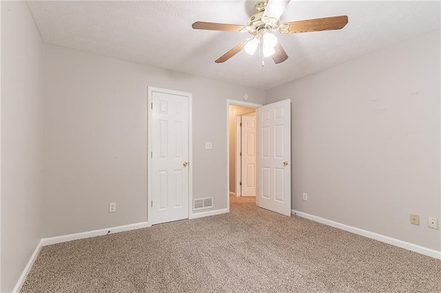 260 Pleasant Grove Cir, Mcdonough, GA 30252 - unfurnished bedroom with carpet, baseboards, and a ceiling fan