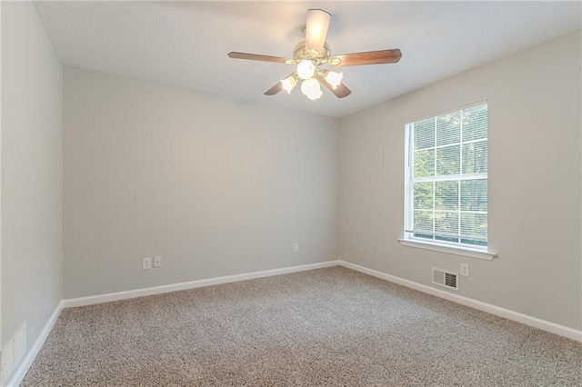 260 Pleasant Grove Cir, Mcdonough, GA 30252 - spare room with carpet, ceiling fan, and baseboards