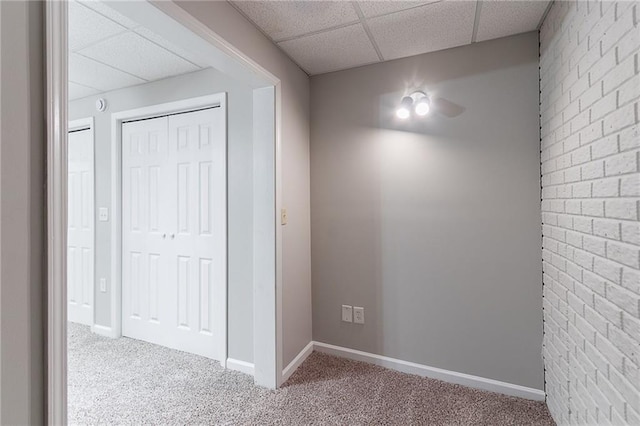 260 Pleasant Grove Cir, Mcdonough, GA 30252 - hall featuring a drop ceiling, carpet floors, and baseboards