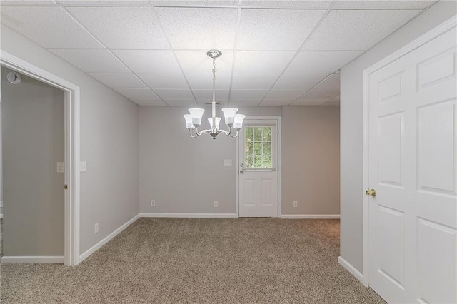 260 Pleasant Grove Cir, Mcdonough, GA 30252 - carpeted spare room featuring a chandelier, a drop ceiling, baseboards, and a smoke detector
